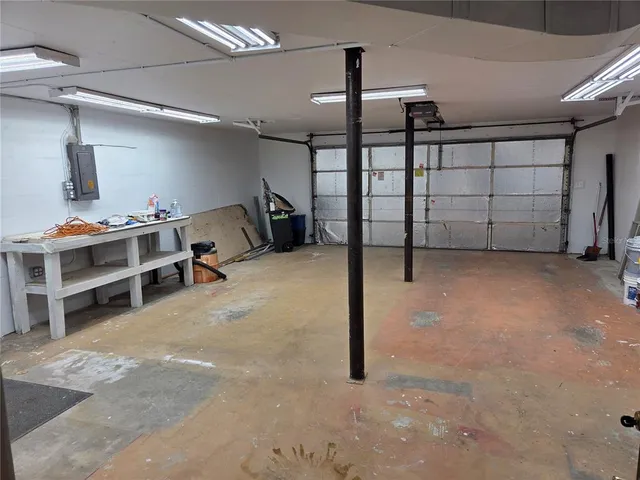 a bathroom with a shower and a sink