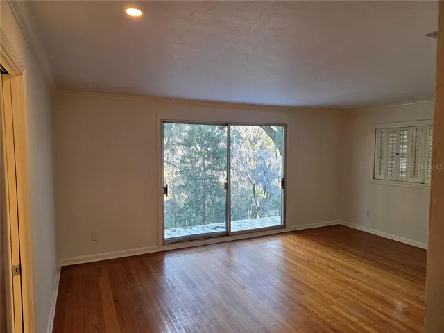 a bathroom with a shower and a toilet