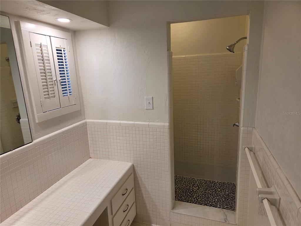 2901 Southwest 4 Court Gainesville, FL 32601 - Photo 52 of 58 a bathroom with a shower and a sink