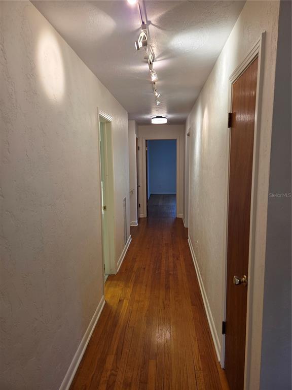 2901 Southwest 4 Court Gainesville, FL 32601 - Photo 53 of 58 a view of a hallway with wooden floor and staircase