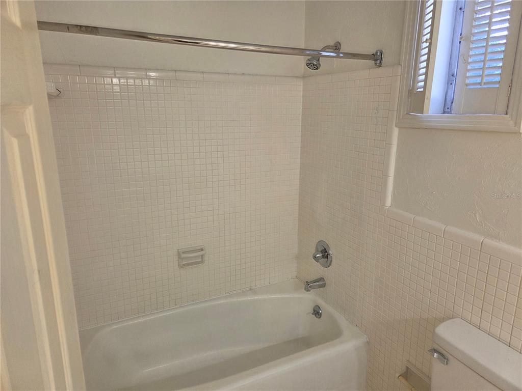 2901 Southwest 4 Court Gainesville, FL 32601 - Photo 56 of 58 a bathroom with a shower and a toilet