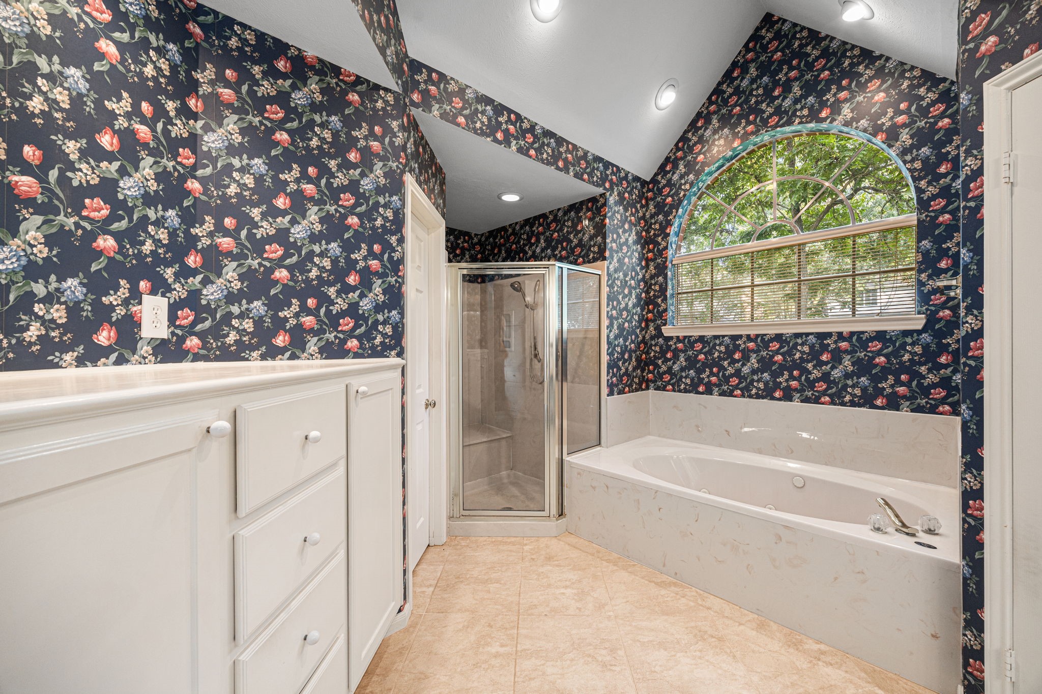 1102 Wood Fern Drive Sugar Land, TX 77479 - Photo 13 of 43 a bathroom with a bathtub and a shower