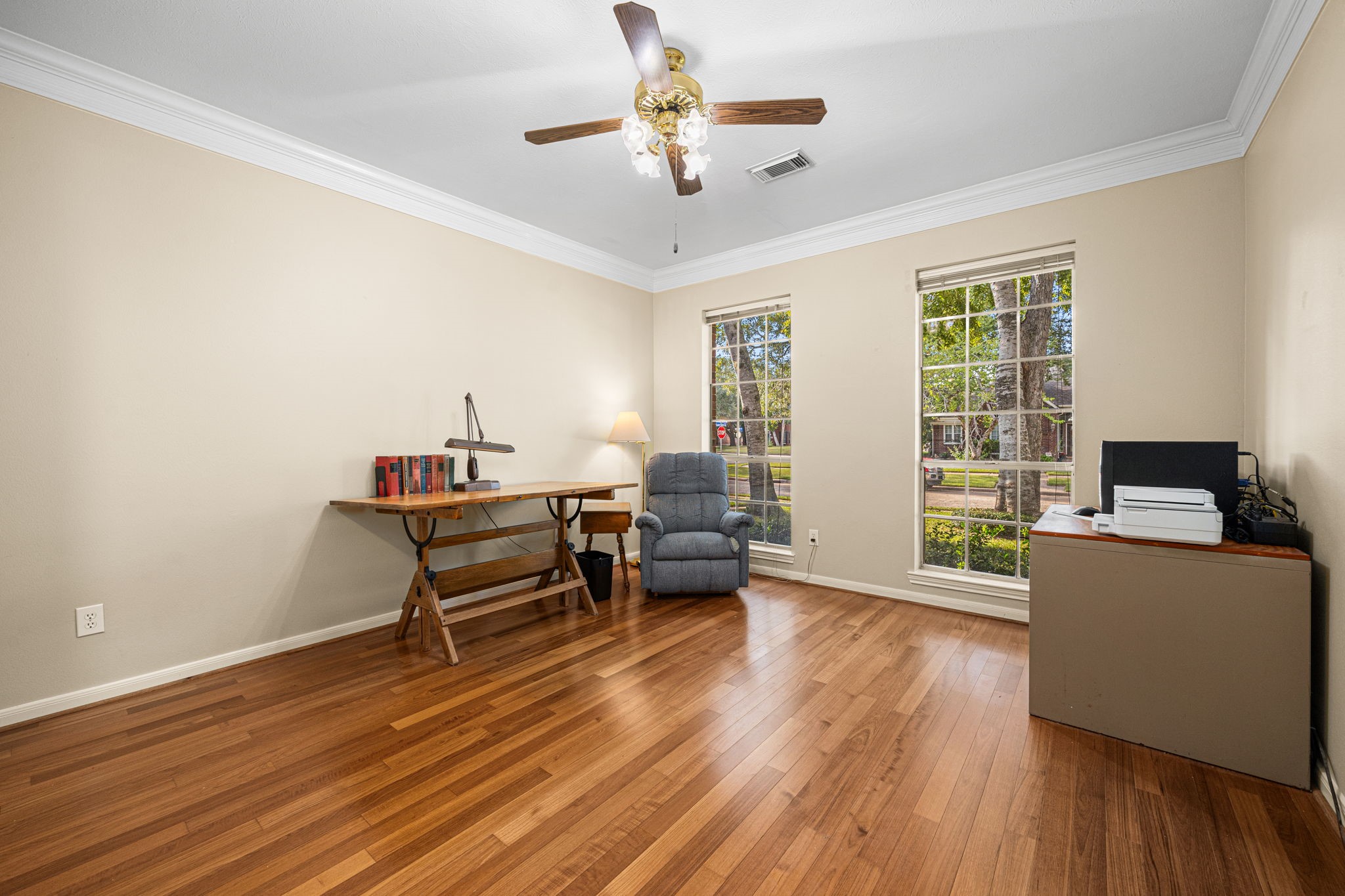 1102 Wood Fern Drive Sugar Land, TX 77479 - Photo 16 of 43 a living room with furniture and a wooden floor