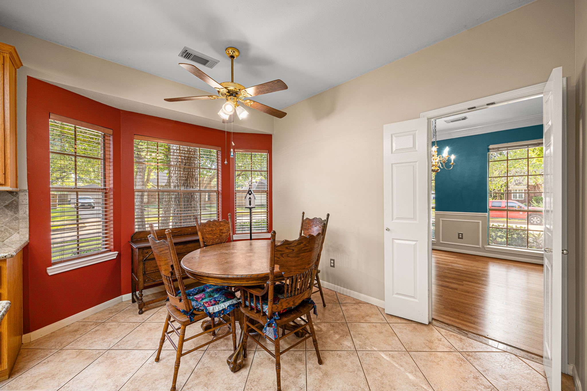 1102 Wood Fern Drive Sugar Land, TX 77479 - Photo 21 of 43 a dining room with furniture a chandelier and a rug