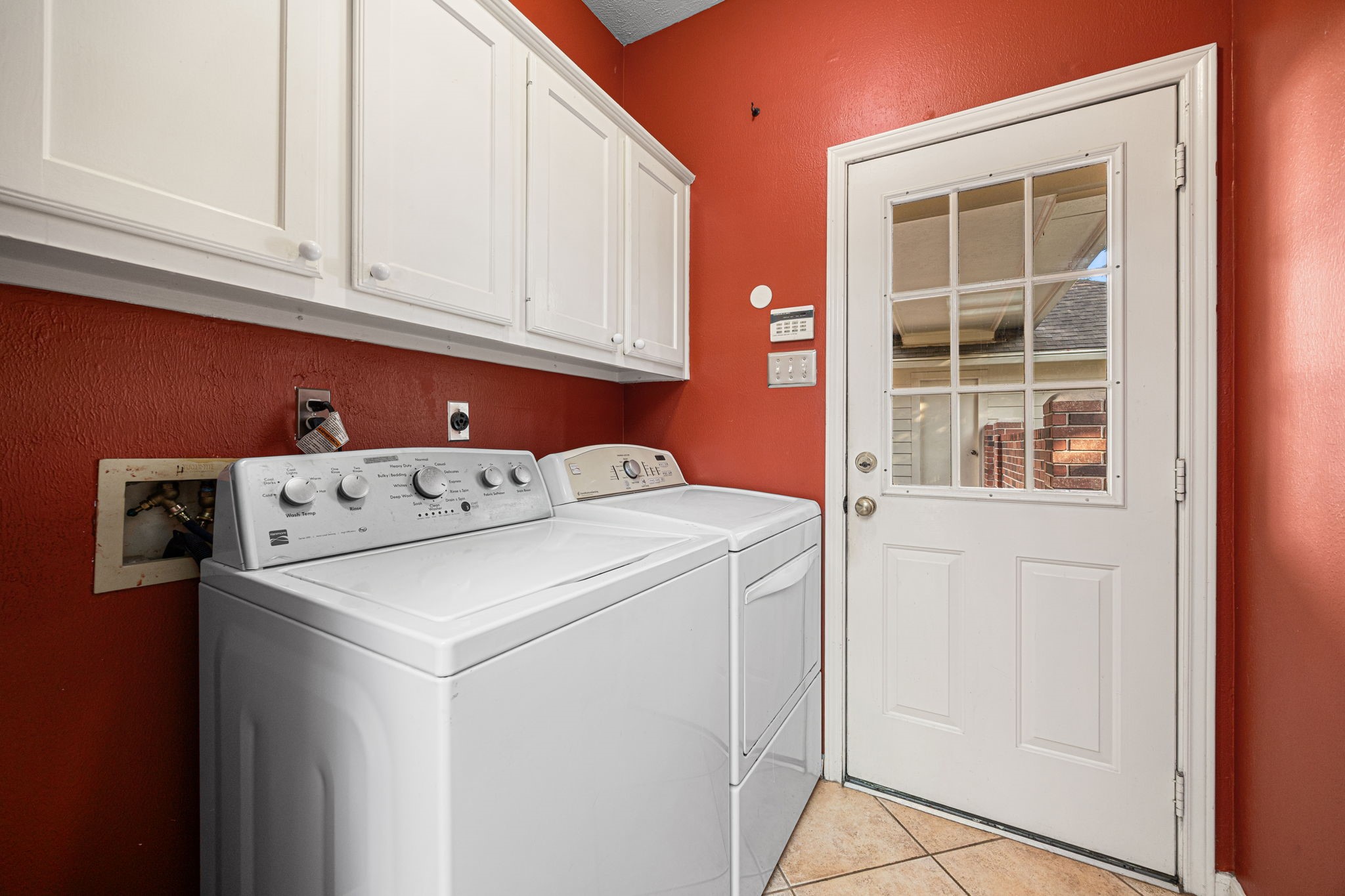 1102 Wood Fern Drive Sugar Land, TX 77479 - Photo 25 of 43 a utility room with dryer and washer