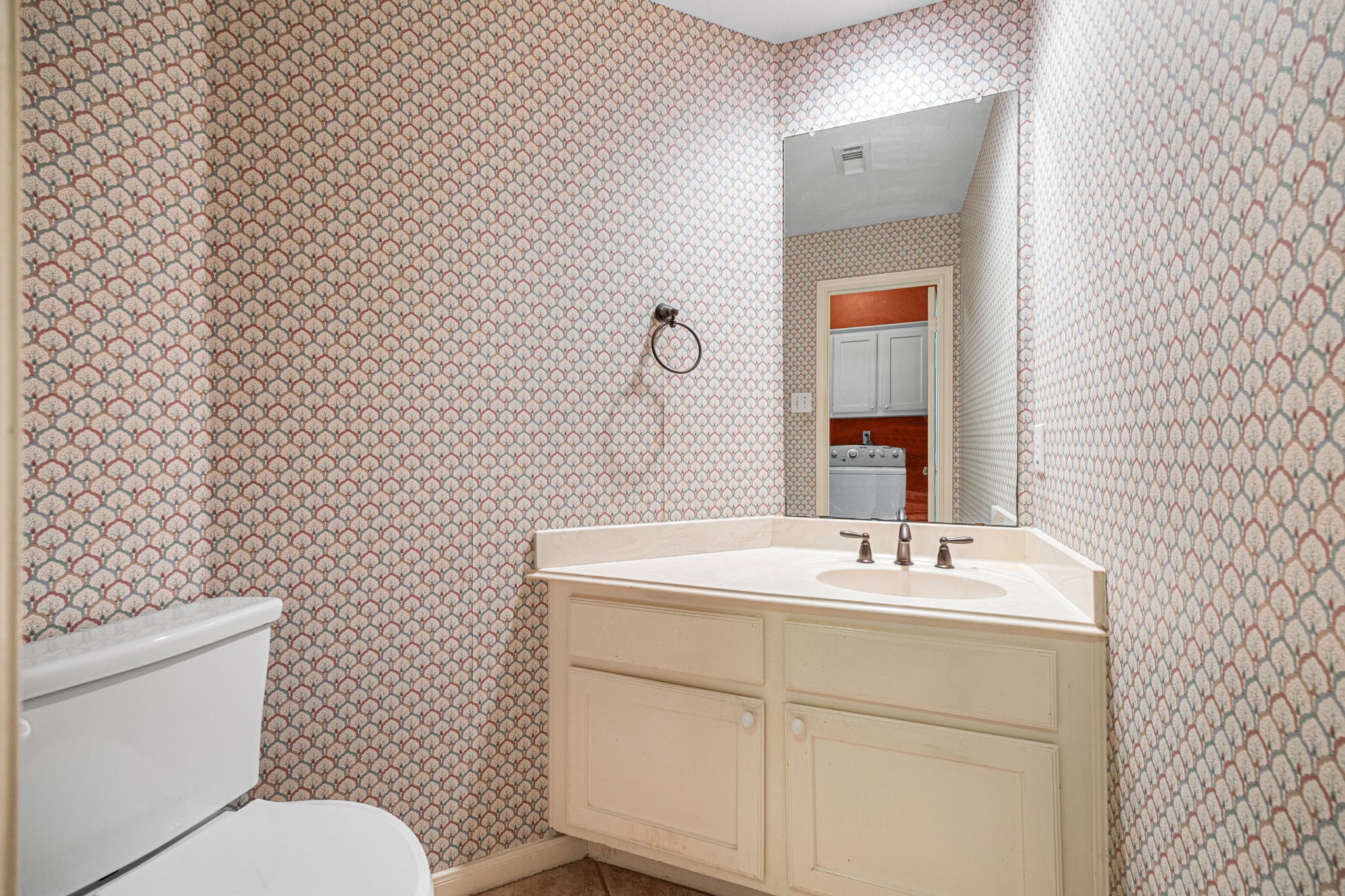 1102 Wood Fern Drive Sugar Land, TX 77479 - Photo 26 of 43 a bathroom with a sink mirror vanity and toilet