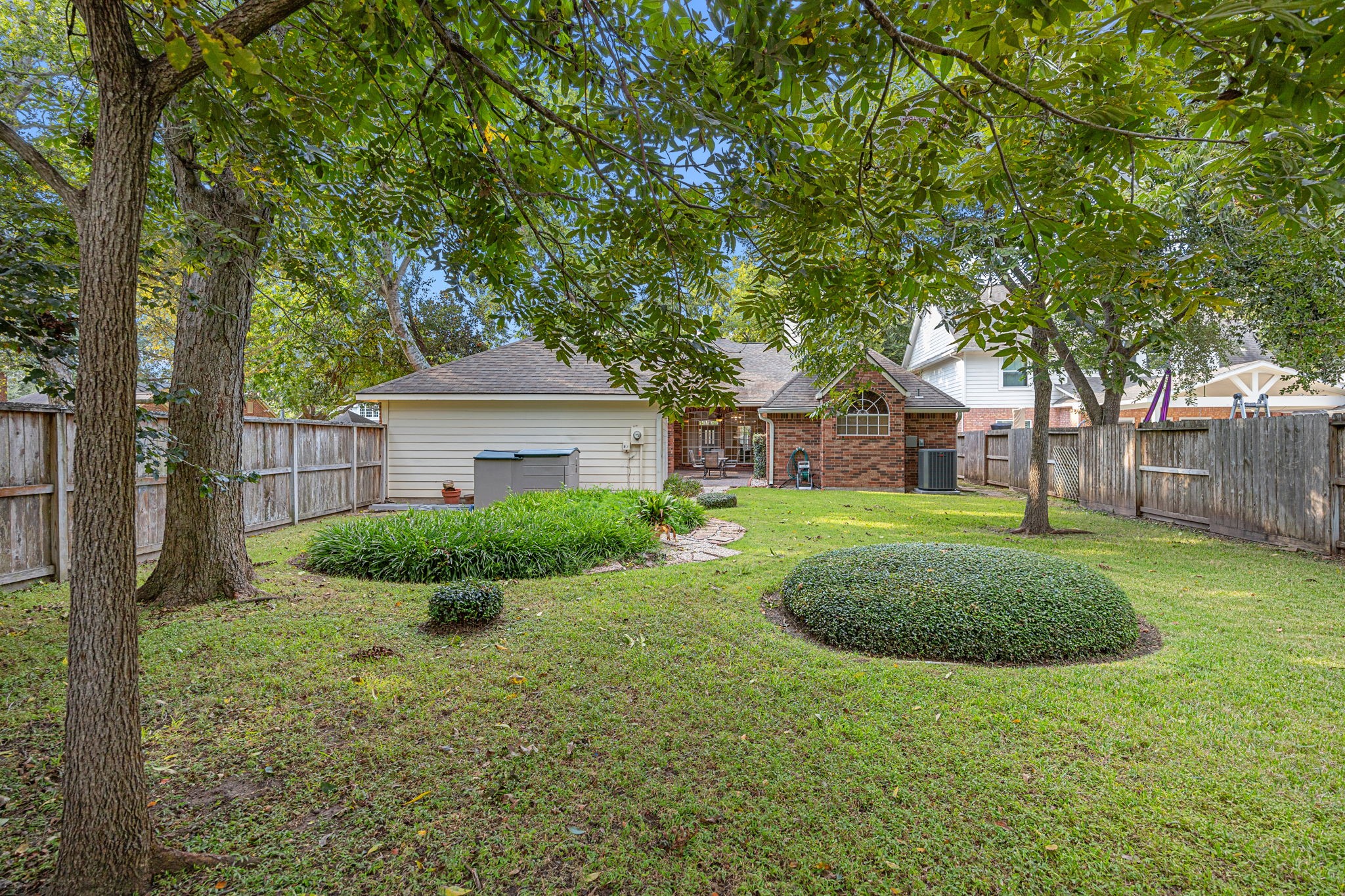 1102 Wood Fern Drive Sugar Land, TX 77479 - Photo 31 of 43 a front view of a house with garden