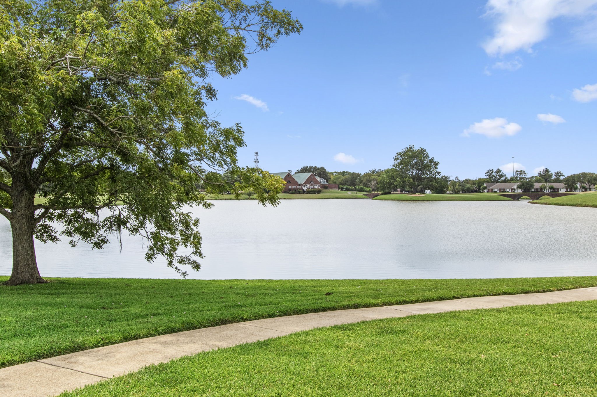 1102 Wood Fern Drive Sugar Land, TX 77479 - Photo 36 of 43 a view of a lake with houses in the background