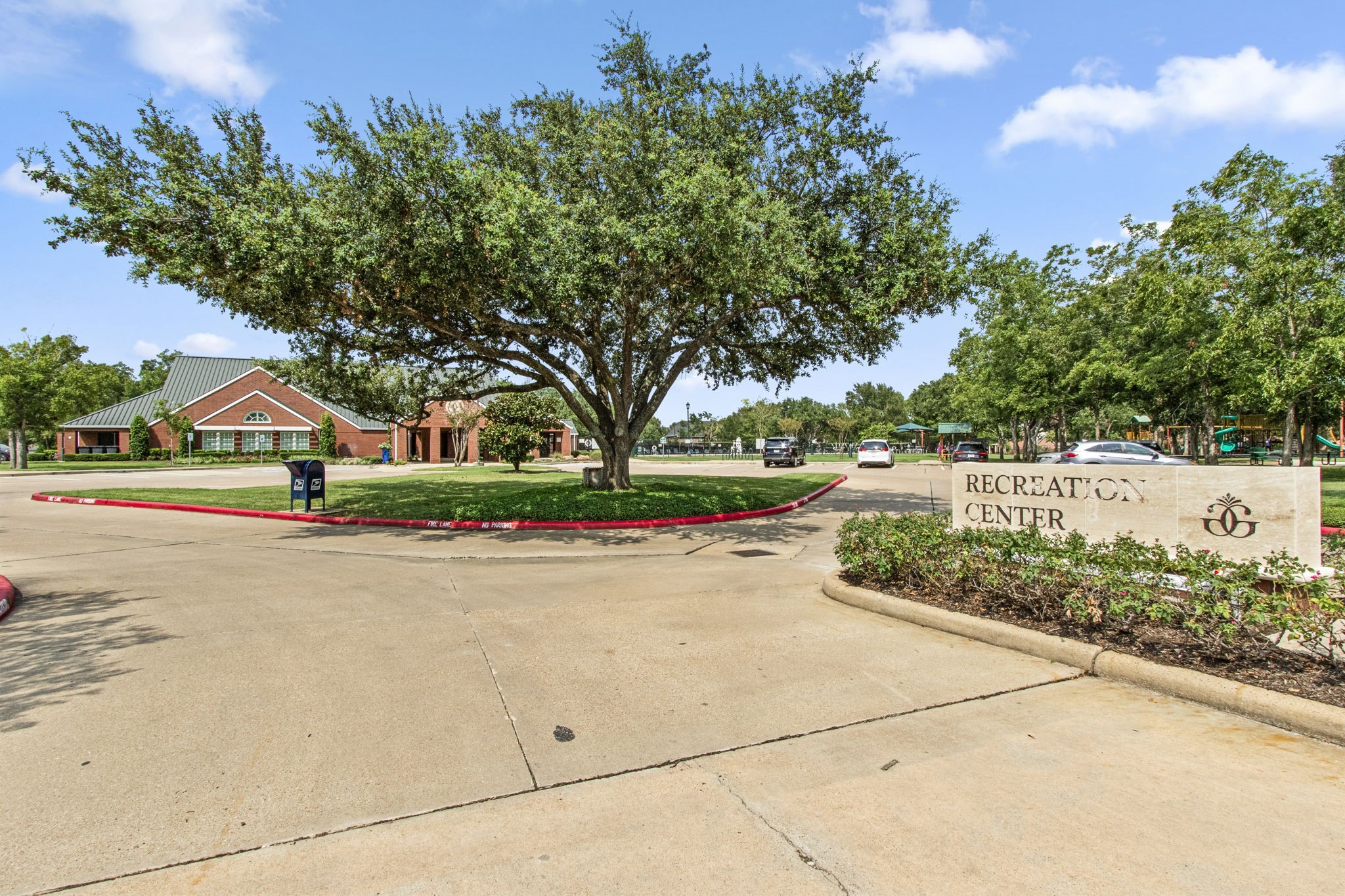 1102 Wood Fern Drive Sugar Land, TX 77479 - Photo 37 of 43 a view of street with houses and trees in the background