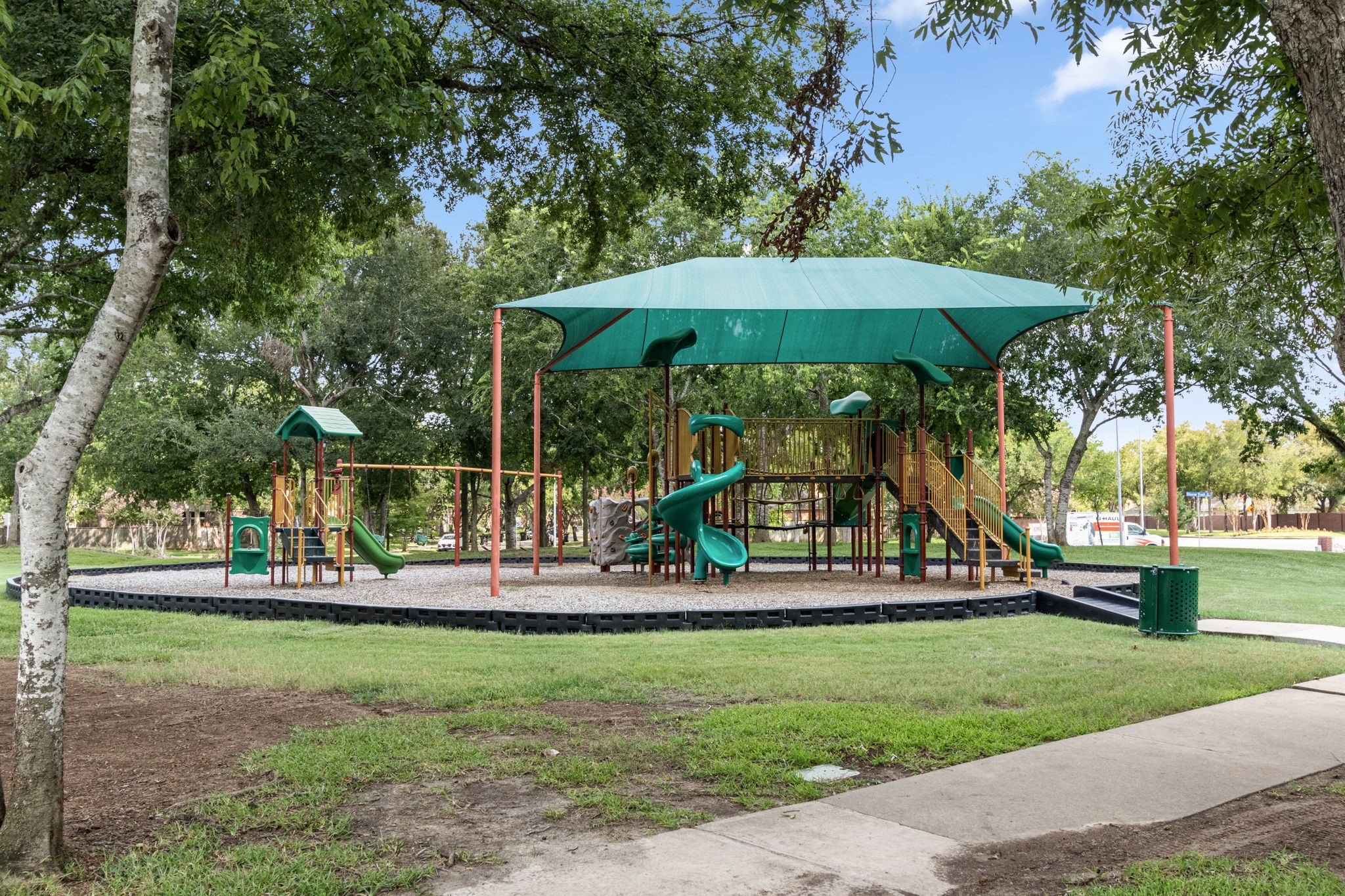 1102 Wood Fern Drive Sugar Land, TX 77479 - Photo 42 of 43 a view of a park with slide