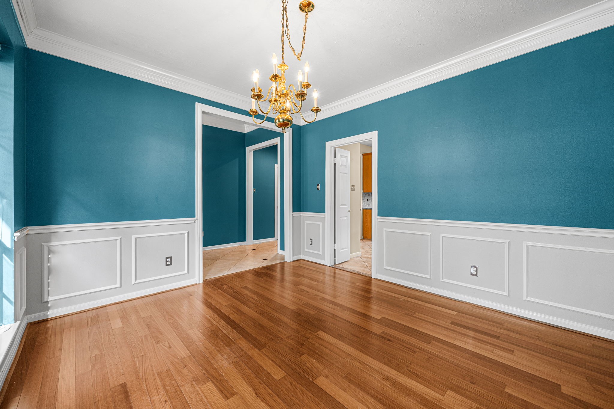 1102 Wood Fern Drive Sugar Land, TX 77479 - Photo 5 of 43 a view of an empty room with window and wooden floor