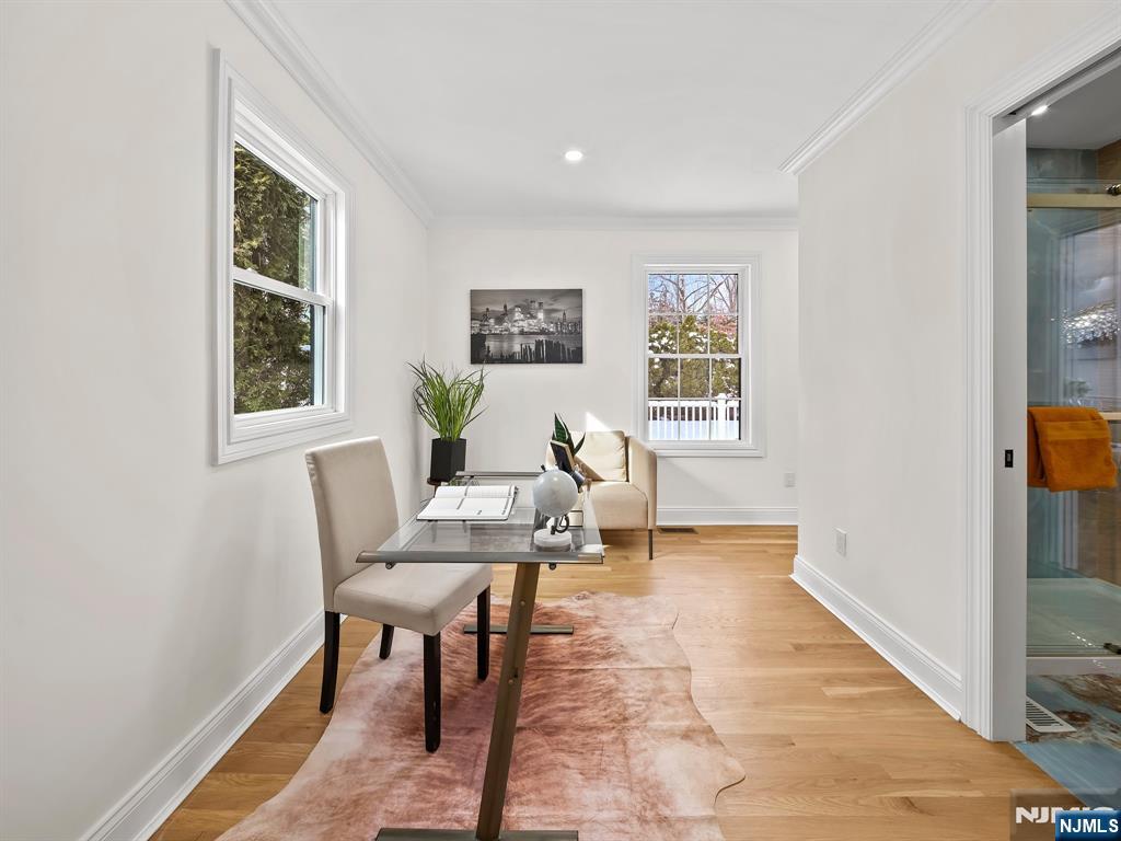 857 Collingwood Avenue Maywood, NJ 07607 - Photo 17 of 30 a living room with furniture and a window
