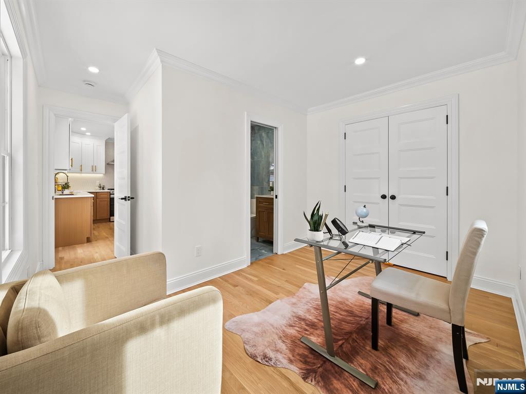 857 Collingwood Avenue Maywood, NJ 07607 - Photo 19 of 30 a living room with furniture and wooden floor