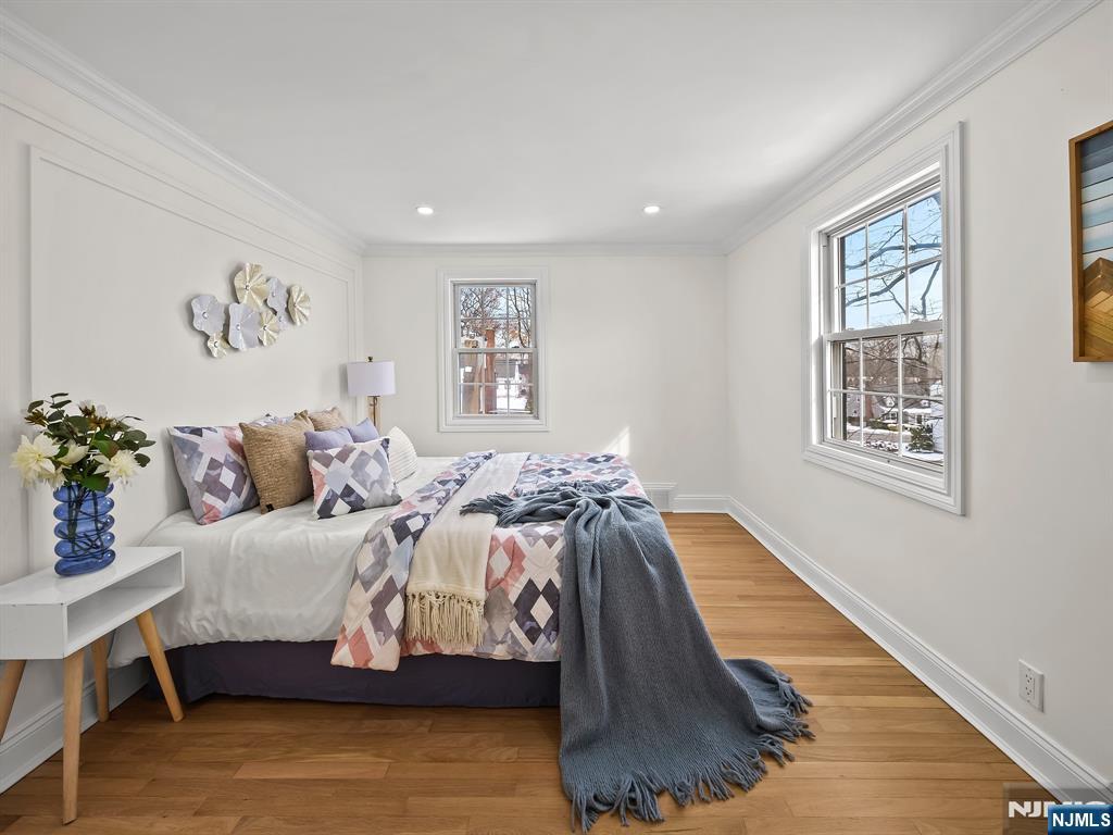 857 Collingwood Avenue Maywood, NJ 07607 - Photo 22 of 30 a bedroom with a bed and a couch