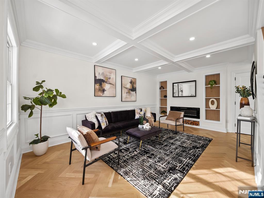 857 Collingwood Avenue Maywood, NJ 07607 - Photo 4 of 30 a living room with furniture and wooden floor