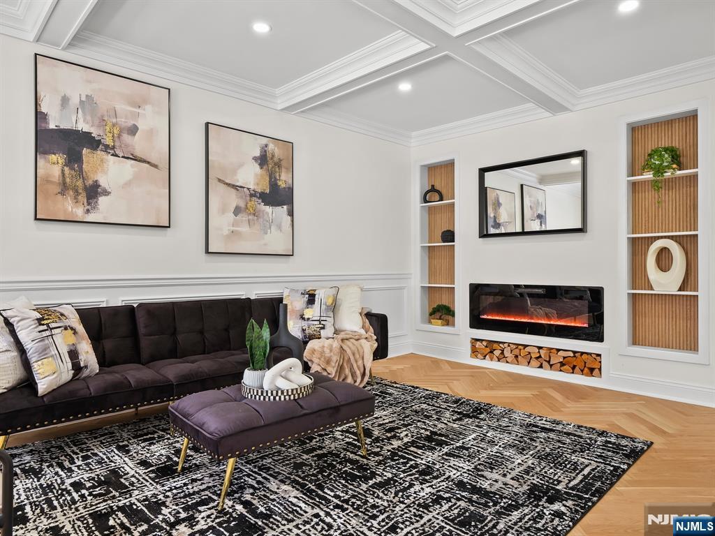 857 Collingwood Avenue Maywood, NJ 07607 - Photo 5 of 30 a living room with furniture and a fireplace