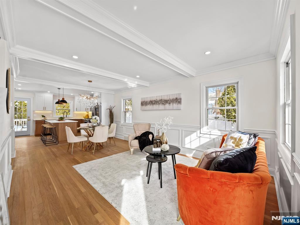 857 Collingwood Avenue Maywood, NJ 07607 - Photo 7 of 30 a living room with furniture and a large window