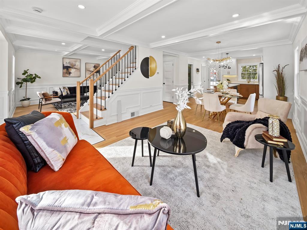 857 Collingwood Avenue Maywood, NJ 07607 - Photo 8 of 30 a living room with furniture kitchen and a table