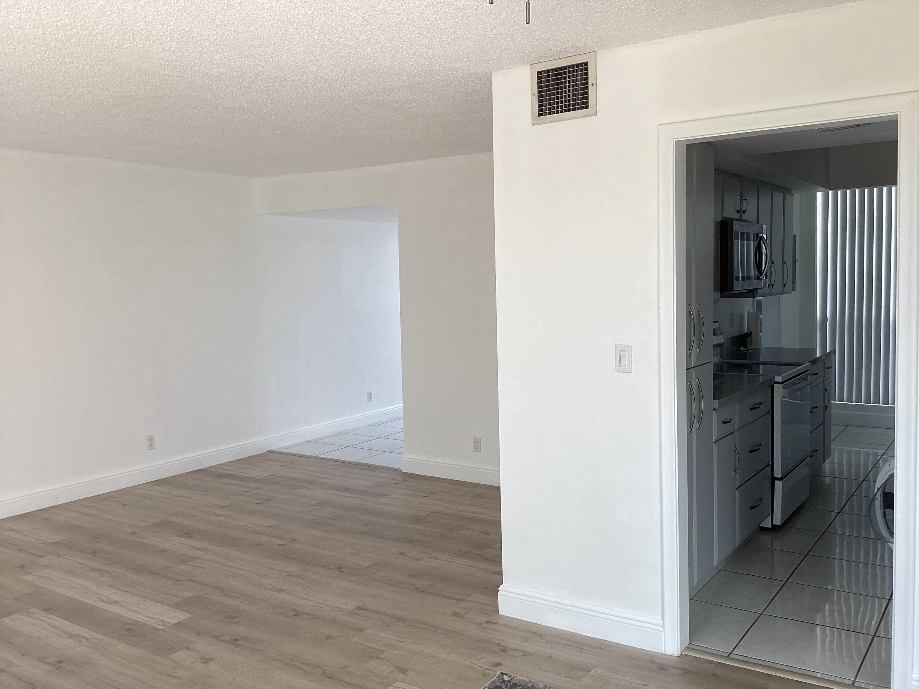 2308 Bridgewood Drive, Unit 2308 Boca Raton, FL 33434 - Photo 12 of 42 wooden floor in a gallery