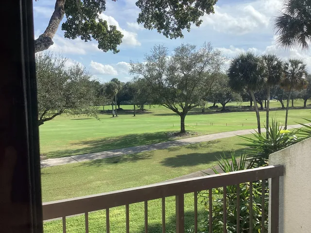 a view of swimming pool with a yard