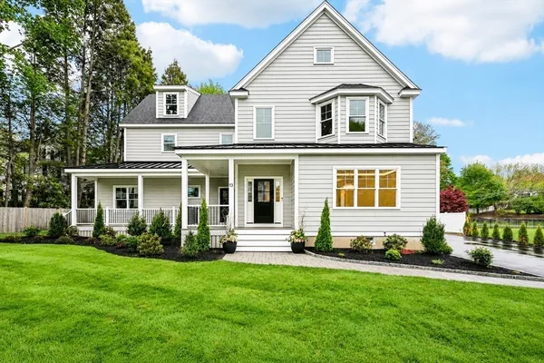 a view of a yard in front of a house