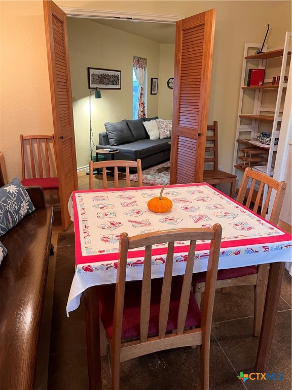 121 Butler Lane Martindale, TX 78655 - Photo 13 of 27 a bedroom with a bed and a table