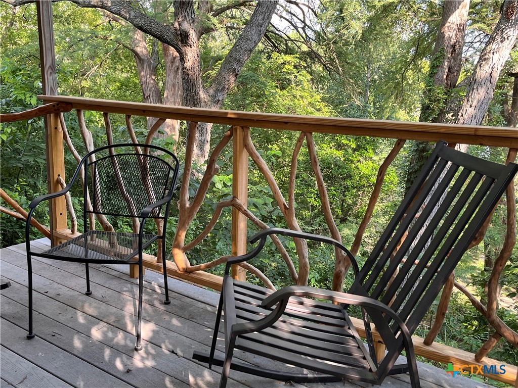 121 Butler Lane Martindale, TX 78655 - Photo 18 of 27 a view of a balcony with chairs