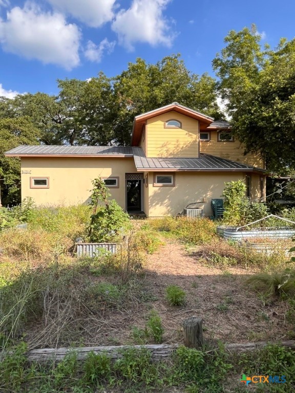 121 Butler Lane Martindale, TX 78655 - Photo 21 of 27 a view of a lake from a yard