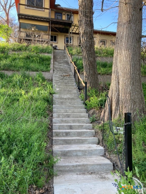 121 Butler Lane Martindale, TX 78655 - Photo 23 of 27 a view of a pathway of house with yard