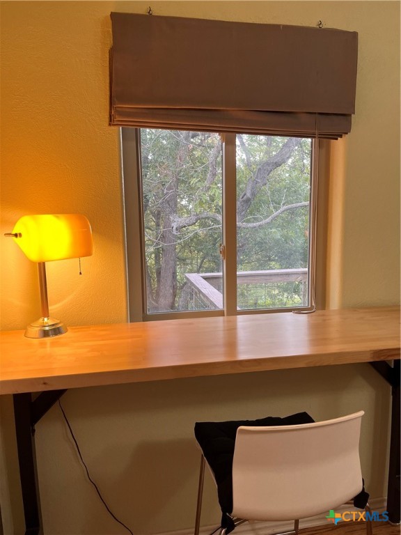 121 Butler Lane Martindale, TX 78655 - Photo 9 of 27 a view of a room with a window and wooden floor