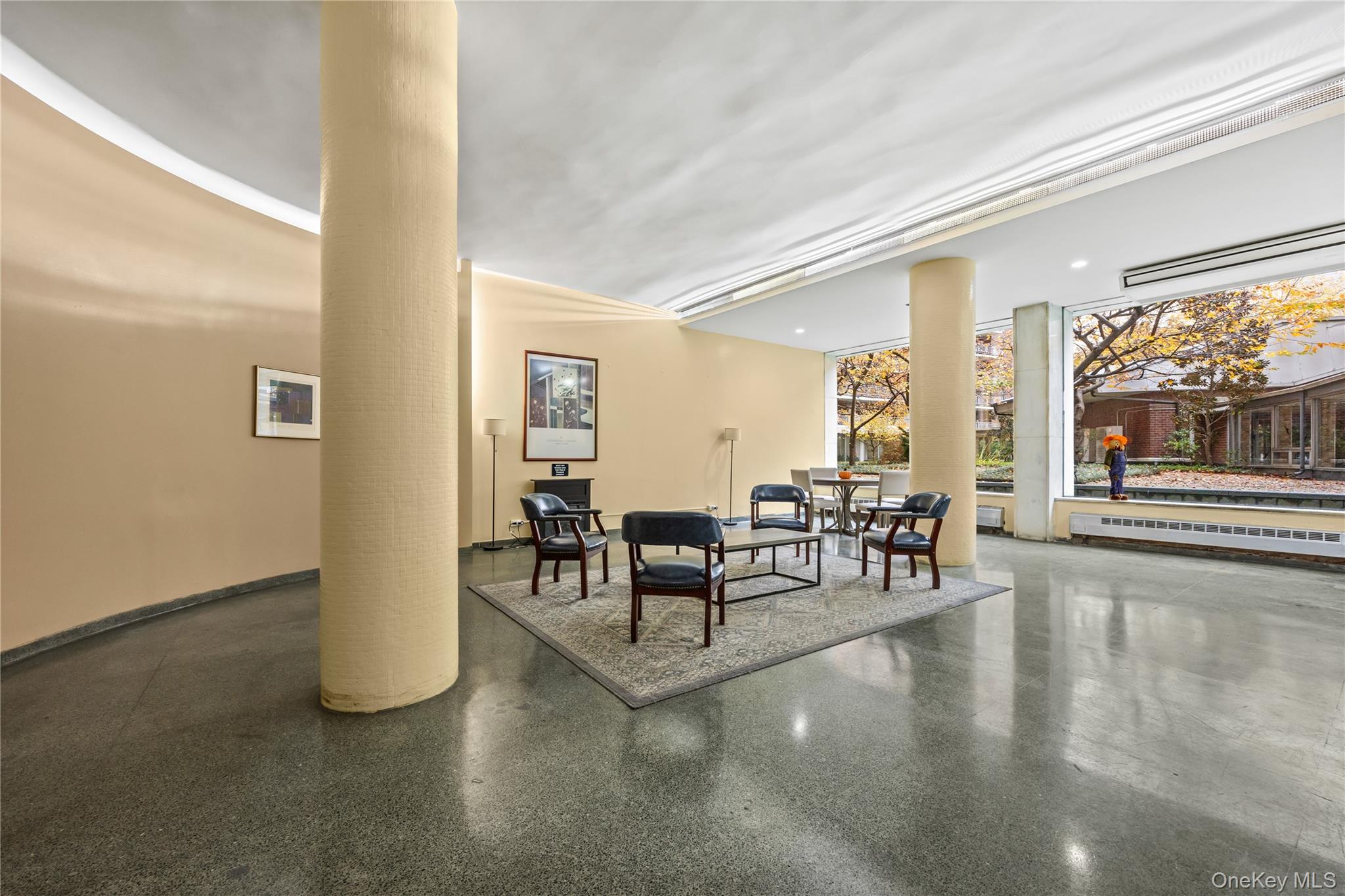61-15 97th Street, Unit 10A Queens, NY 11374 - Photo 16 of 21 Community lobby with recessed lighting