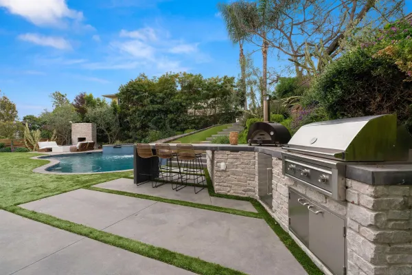 a view of a terrace with wooden fence