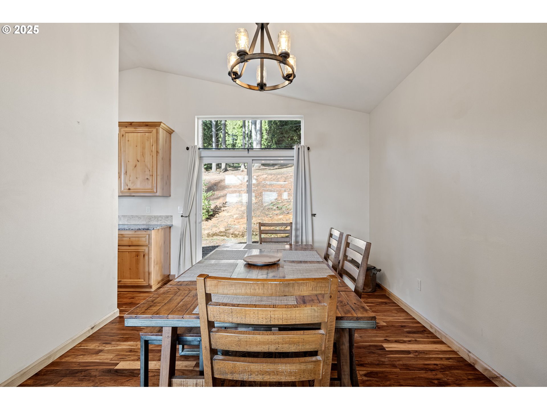 24674 Bolton Hill Road Veneta, OR 97487 - Photo 21 of 48 a dining room with a table and chairs