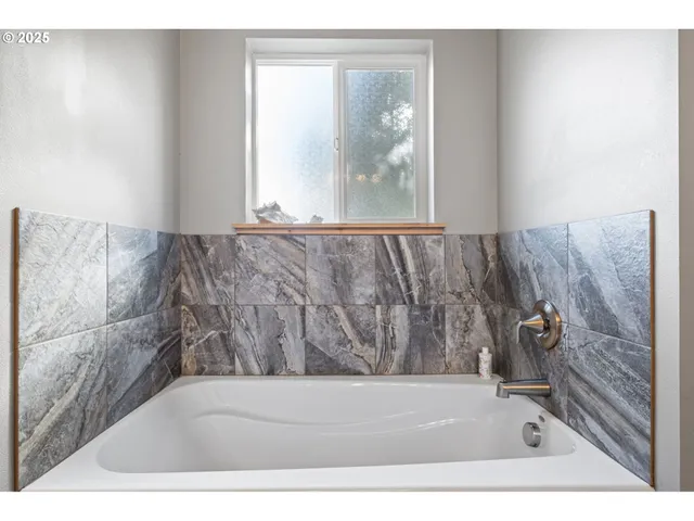 a bathroom with a bathtub