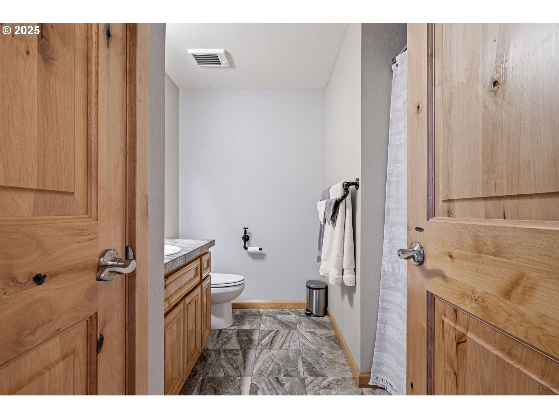 24674 Bolton Hill Road Veneta, OR 97487 - Photo 31 of 48 a bathroom with a sink and a mirror