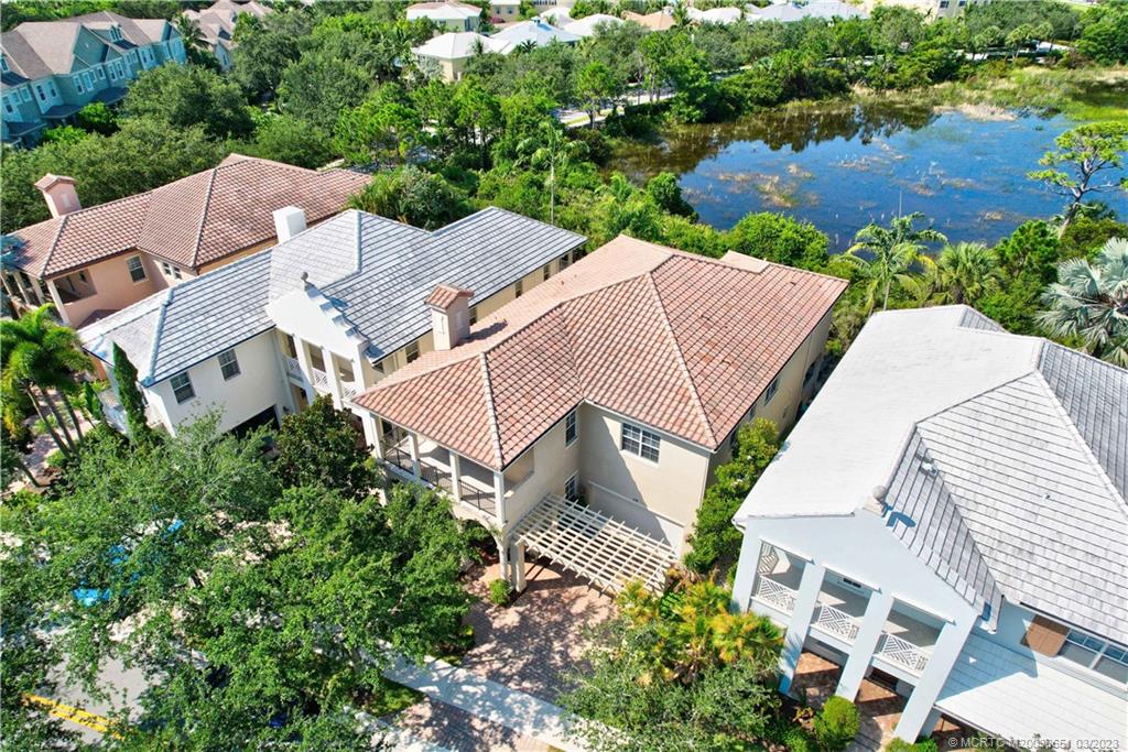 112 Tulip Tree Court Jupiter, FL 33458 - Photo 11 of 76 an aerial view of a house with garden space and lake view