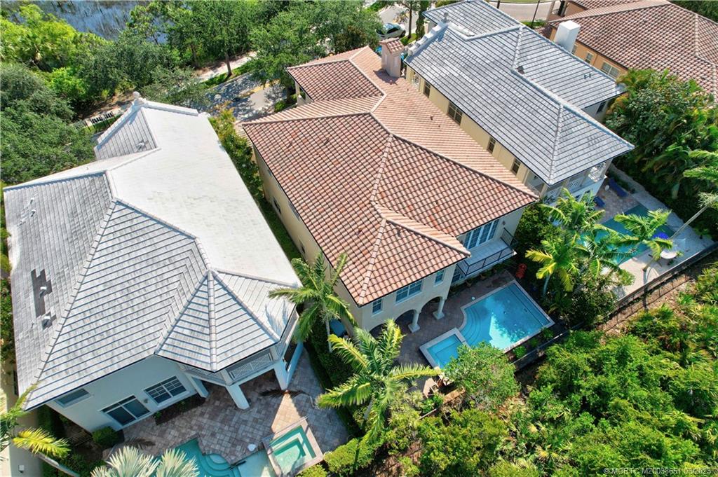 112 Tulip Tree Court Jupiter, FL 33458 - Photo 13 of 76 an aerial view of a house with a garden and plants