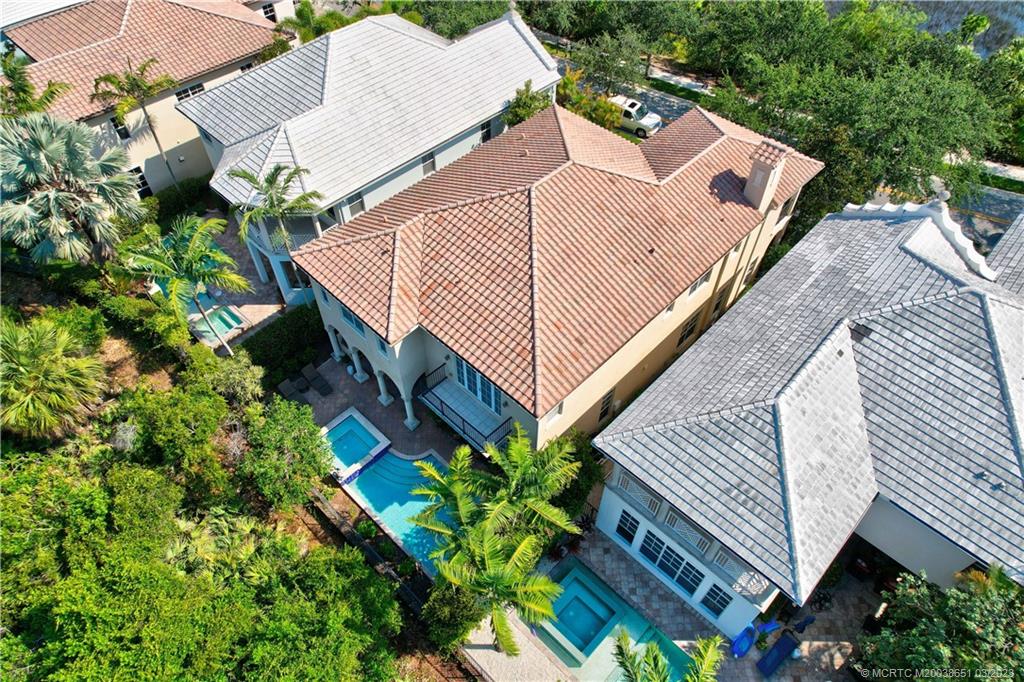 112 Tulip Tree Court Jupiter, FL 33458 - Photo 15 of 76 an aerial view of house with yard and swimming pool