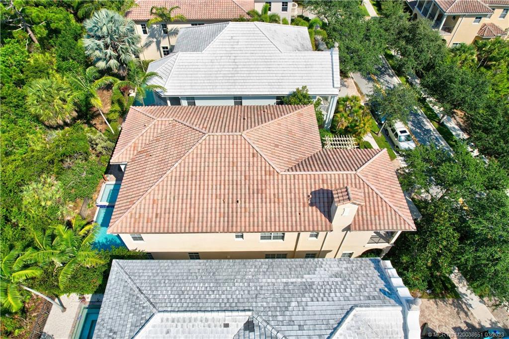 112 Tulip Tree Court Jupiter, FL 33458 - Photo 16 of 76 an aerial view of a house with backyard