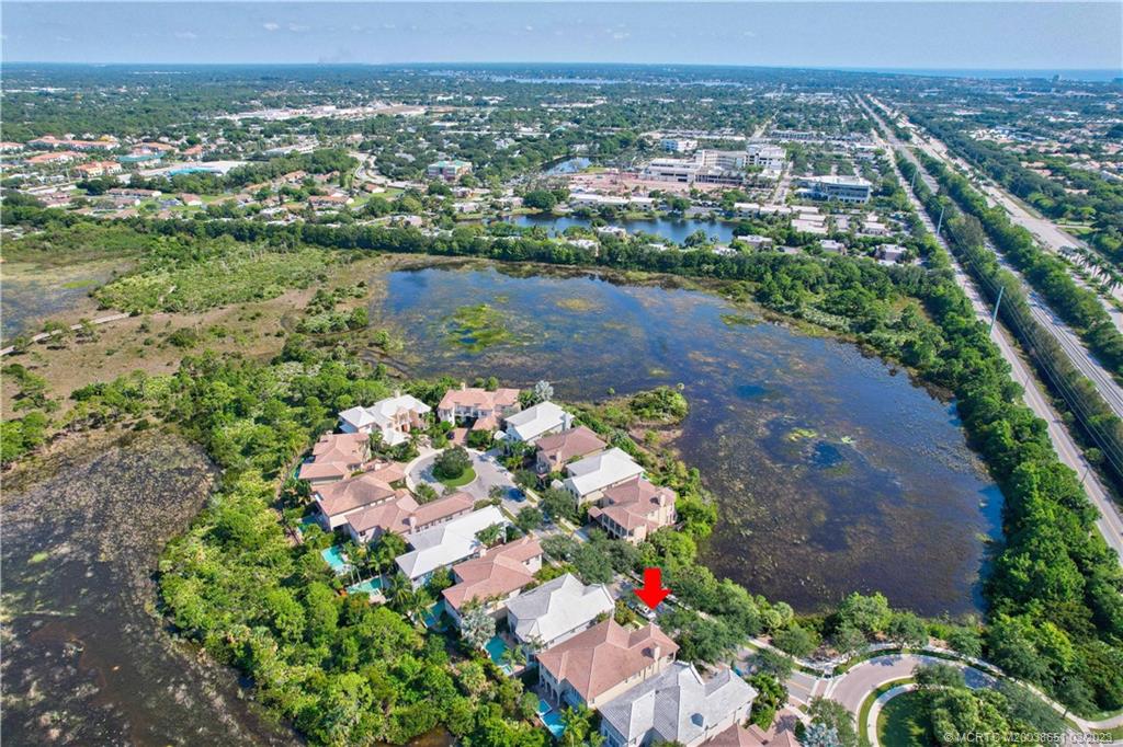 112 Tulip Tree Court Jupiter, FL 33458 - Photo 17 of 76 an aerial view of a house with a lake view