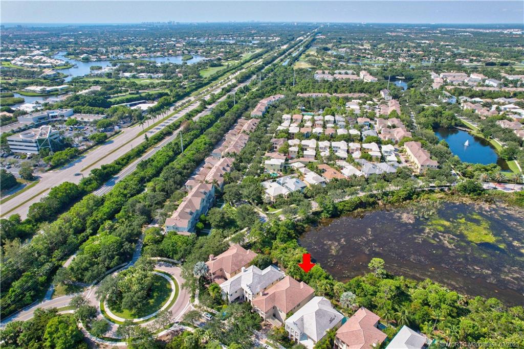 112 Tulip Tree Court Jupiter, FL 33458 - Photo 21 of 76 an aerial view of residential houses with outdoor space and trees