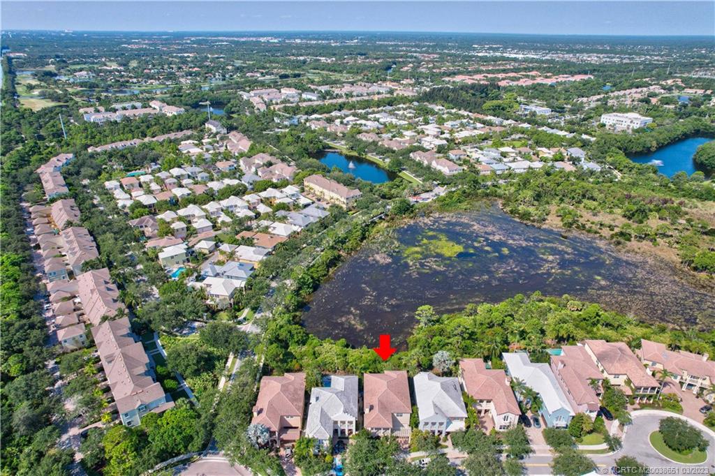 112 Tulip Tree Court Jupiter, FL 33458 - Photo 22 of 76 an aerial view of a houses with a yard