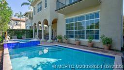 112 Tulip Tree Court Jupiter, FL 33458 - Photo 34 of 76 a view of a house with backyard and sitting area