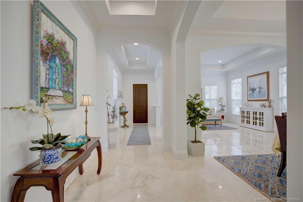 112 Tulip Tree Court Jupiter, FL 33458 - Photo 39 of 76 a living room with furniture and potted plant