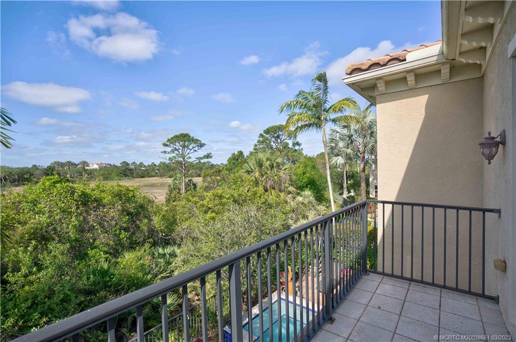 112 Tulip Tree Court Jupiter, FL 33458 - Photo 4 of 76 a view of a pathway of a balcony