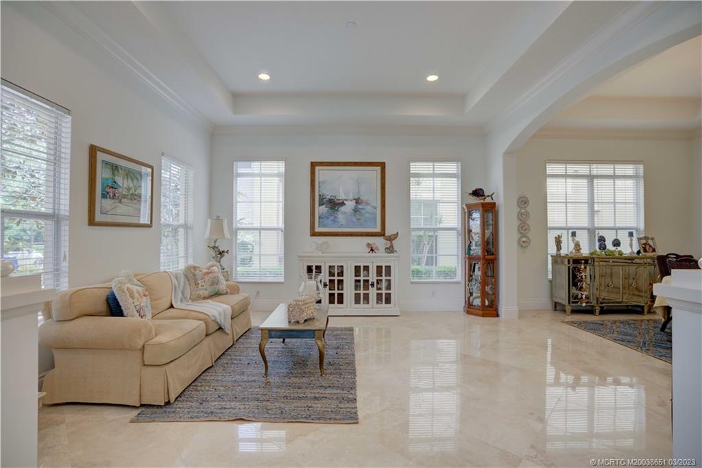 112 Tulip Tree Court Jupiter, FL 33458 - Photo 41 of 76 a living room with furniture and a flat screen tv