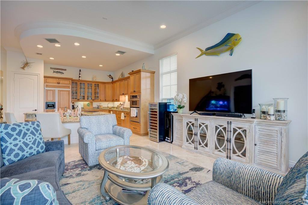 112 Tulip Tree Court Jupiter, FL 33458 - Photo 53 of 76 a living room with furniture and a flat screen tv