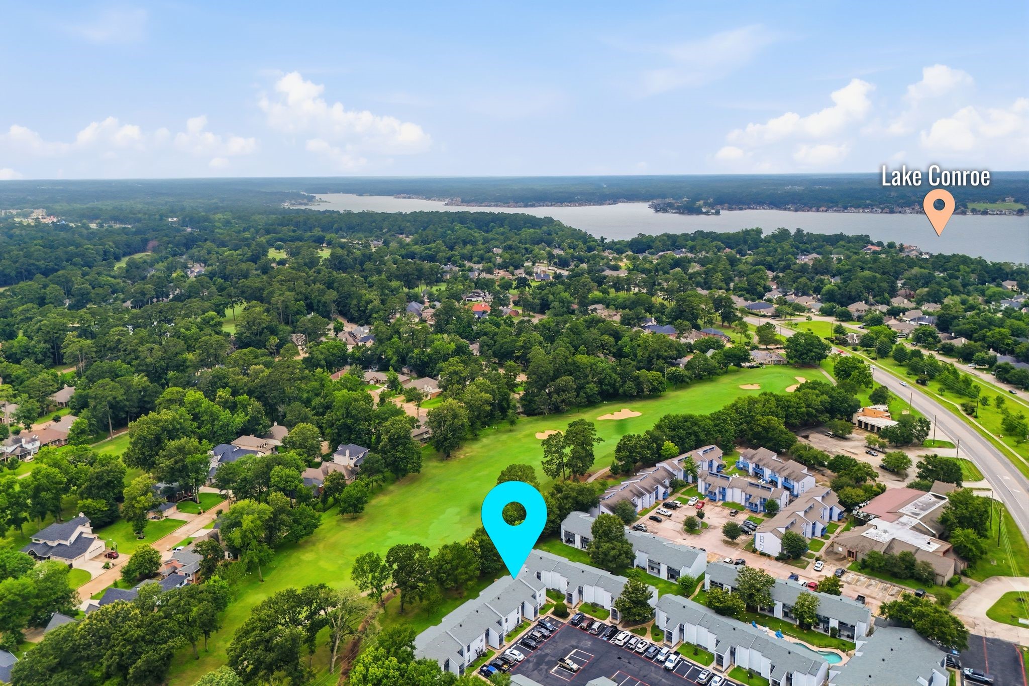 13151 Walden Road, Unit 131 Montgomery, TX 77356 - Photo 30 of 35 Sweeping aerial view showcasing the community setting and nearby green spaces.