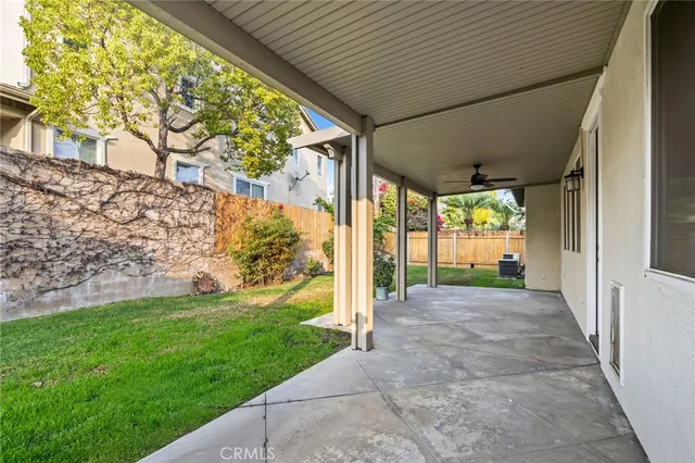 a view of a porch with a tree