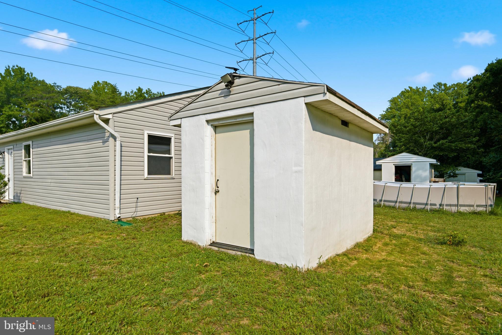 650 Field Road Lusby, MD 20657 - Photo 25 of 27 Storage/out building.